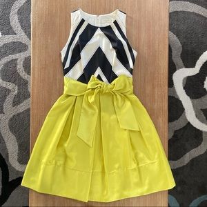 Green with black & white geometric pattern dress